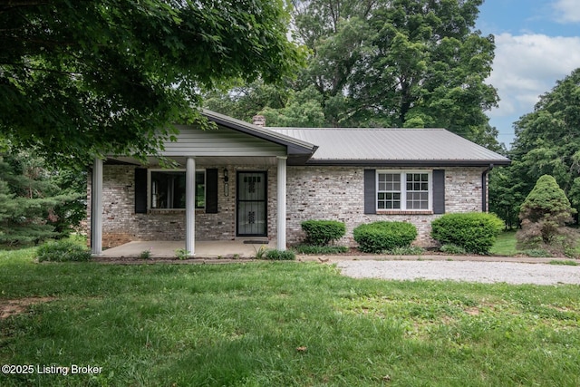 4217 Deckard School Rd, Radcliff, KY 40160 - ranch-style house featuring metal roof, covered porch, and a front yard