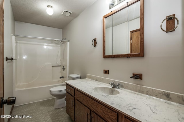 4217 Deckard School Rd, Radcliff, KY 40160 - bathroom featuring toilet, vanity, tub / shower combination, a textured ceiling, and tile patterned floors