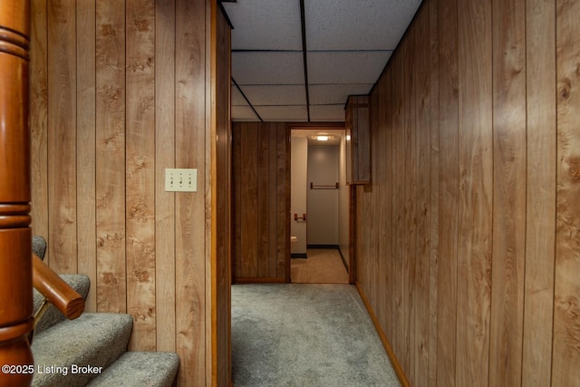 4217 Deckard School Rd, Radcliff, KY 40160 - hall featuring carpet floors, wood walls, a drop ceiling, and stairs