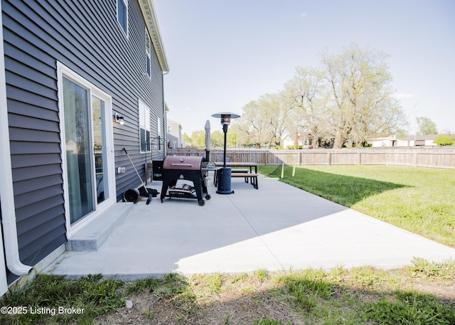 view of patio / terrace featuring area for grilling and a fenced backyard