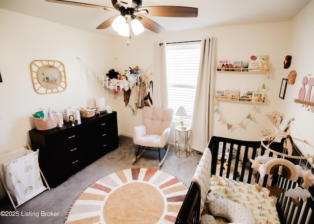 bedroom with ceiling fan and carpet floors