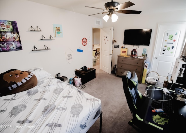 bedroom with visible vents, ceiling fan, and carpet
