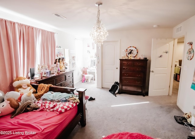 bedroom featuring visible vents, a notable chandelier, and carpet floors