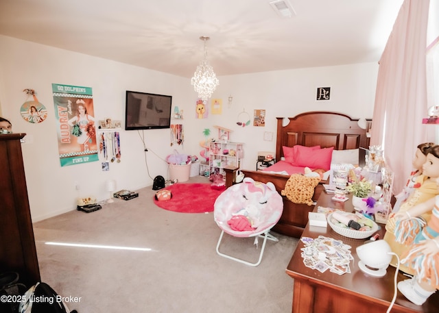 bedroom with visible vents, an inviting chandelier, and carpet