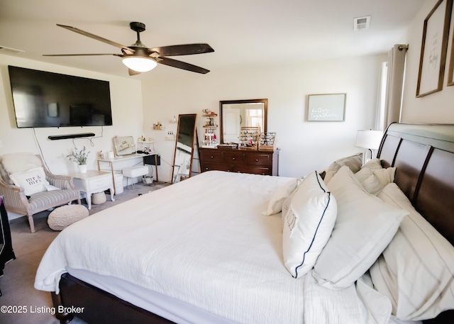 bedroom featuring visible vents and ceiling fan