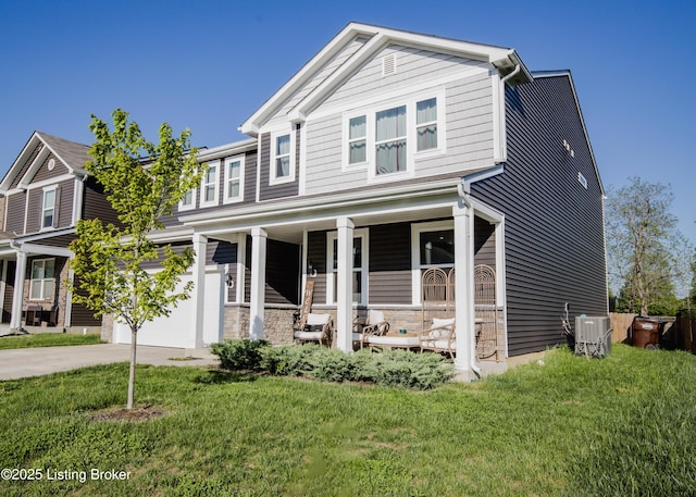 craftsman house featuring concrete driveway, central air condition unit, a front yard, a porch, and a garage