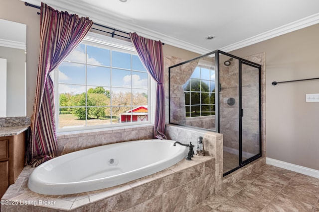 bathroom featuring a healthy amount of sunlight, ornamental molding, a stall shower, and a bath