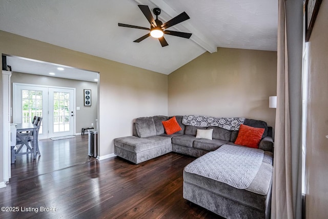 living room featuring dark wood-style flooring, ceiling fan, and baseboards