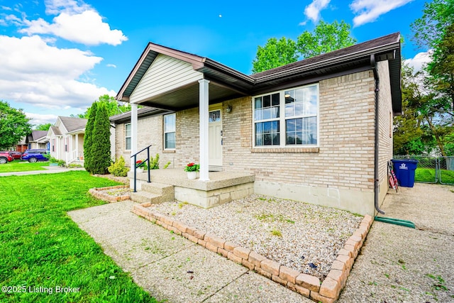view of front of home with brick siding