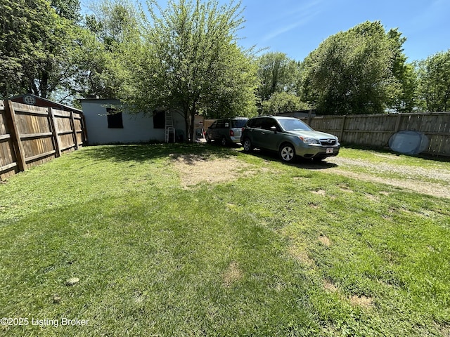 view of yard featuring a fenced backyard