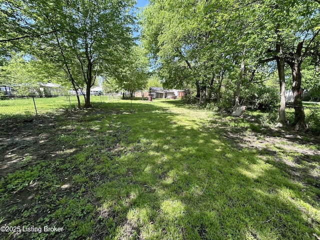 view of yard featuring fence