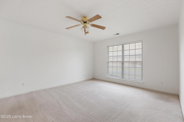 10436 Monticello Forest Cir, Louisville, KY 40299 - empty room with visible vents, a ceiling fan, baseboards, and light carpet