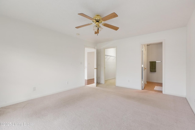 10436 Monticello Forest Cir, Louisville, KY 40299 - unfurnished bedroom with ensuite bathroom, a walk in closet, and light carpet