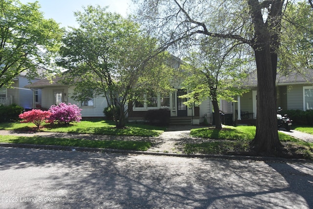 obstructed view of property featuring entry steps