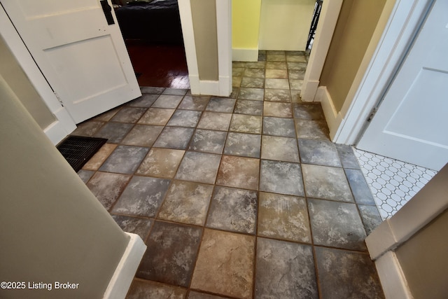 room details featuring baseboards and visible vents
