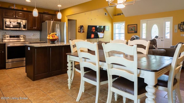 113 Chattanooga Dr, Coxs Creek, KY 40013 - dining space featuring lofted ceiling, light tile patterned flooring, and recessed lighting