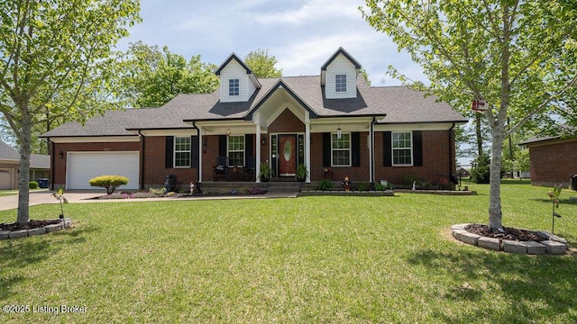 113 Chattanooga Dr, Coxs Creek, KY 40013 - cape cod house with driveway, covered porch, brick siding, a front lawn, and a garage
