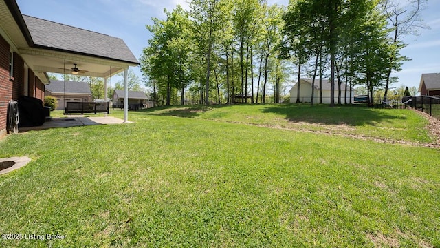 113 Chattanooga Dr, Coxs Creek, KY 40013 - view of yard featuring a patio, fence, and a ceiling fan