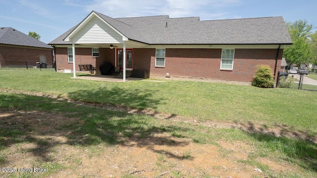 113 Chattanooga Dr, Coxs Creek, KY 40013 - rear view of house with a patio, ceiling fan, a yard, brick siding, and a fenced backyard