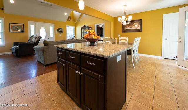 113 Chattanooga Dr, Coxs Creek, KY 40013 - kitchen with baseboards, a chandelier, a healthy amount of sunlight, and vaulted ceiling