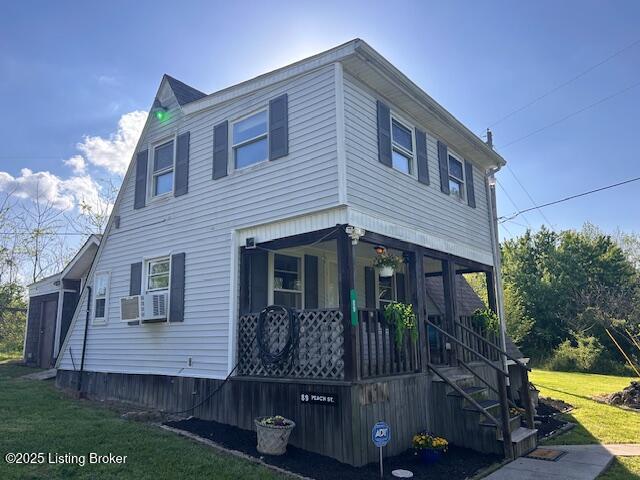 89 Peach St, New Haven, KY 40051 - view of front of house featuring a front lawn and covered porch