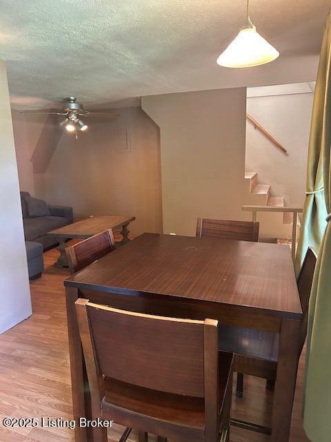 89 Peach St, New Haven, KY 40051 - dining room with a ceiling fan, stairway, wood finished floors, and a textured ceiling