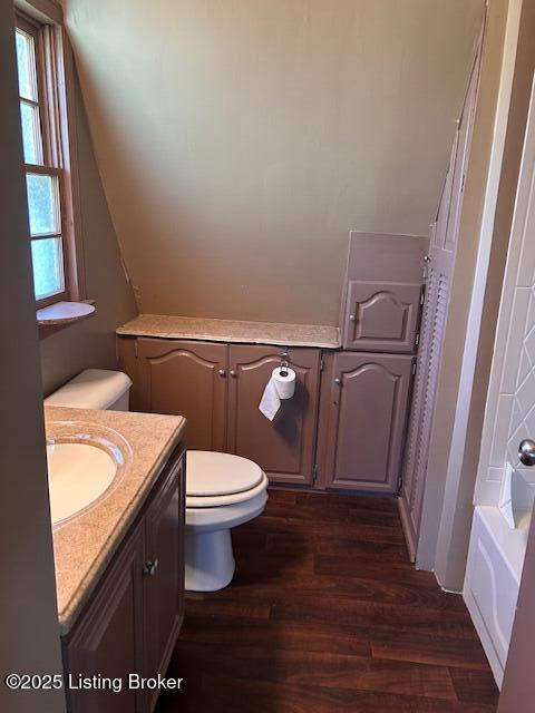 89 Peach St, New Haven, KY 40051 - bathroom featuring wood finished floors, toilet, a bathtub, and vanity