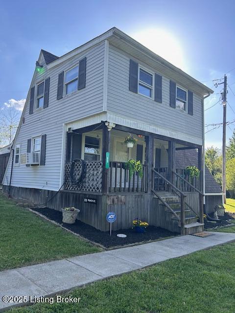 89 Peach St, New Haven, KY 40051 - view of front of home featuring covered porch, a front lawn, and stairs