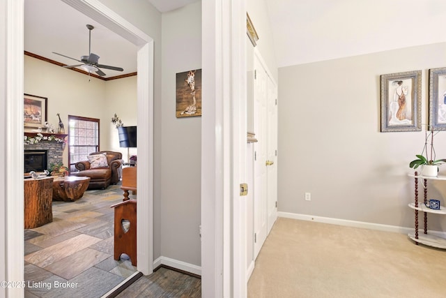 hallway featuring baseboards