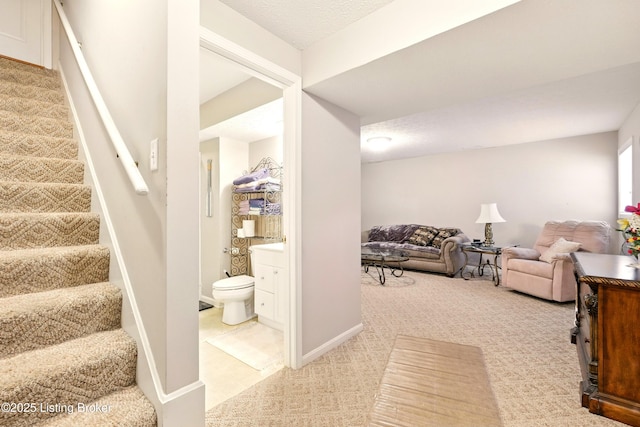 staircase with carpet