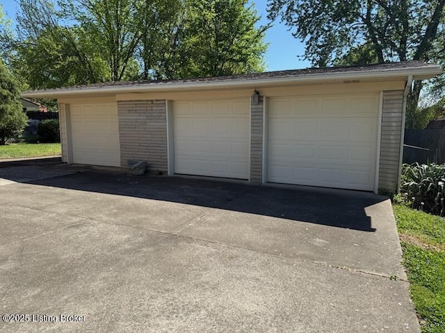 detached garage with fence