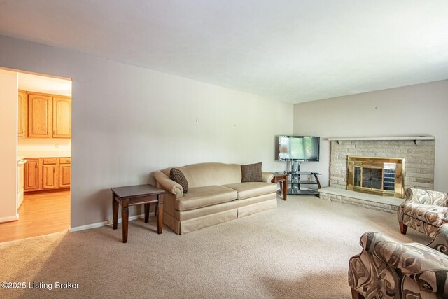 8701 Cottingham Way, Louisville, KY 40258 - living room featuring light colored carpet and a brick fireplace
