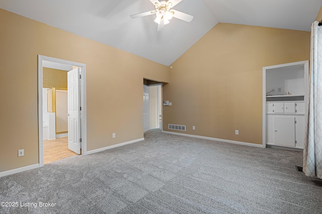 8507 Missionary Ct, Louisville, KY 40291 - unfurnished bedroom with visible vents, carpet floors, baseboards, high vaulted ceiling, and a ceiling fan