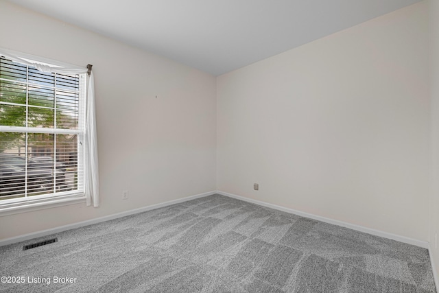 8507 Missionary Ct, Louisville, KY 40291 - spare room featuring carpet flooring, baseboards, and visible vents