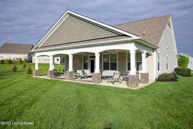 2854 Hamilton Springs Dr, Louisville, KY 40245 - back of house featuring a lawn, a ceiling fan, roof with shingles, and a patio area