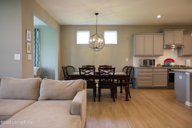2854 Hamilton Springs Dr, Louisville, KY 40245 - dining area with a chandelier, light wood-style floors, and recessed lighting