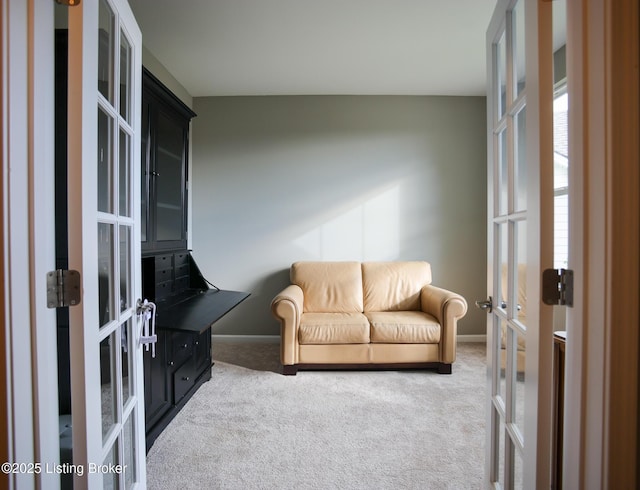 2854 Hamilton Springs Dr, Louisville, KY 40245 - sitting room with french doors, carpet floors, and baseboards