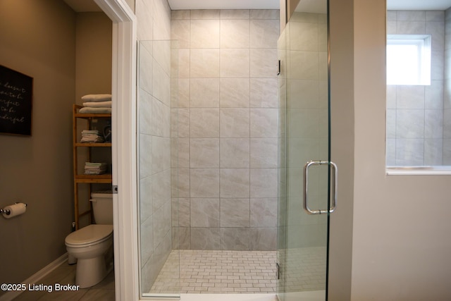 2854 Hamilton Springs Dr, Louisville, KY 40245 - bathroom with a shower stall, toilet, and baseboards