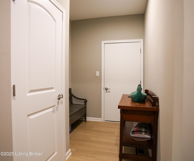 2854 Hamilton Springs Dr, Louisville, KY 40245 - doorway to outside with light wood-style floors and baseboards