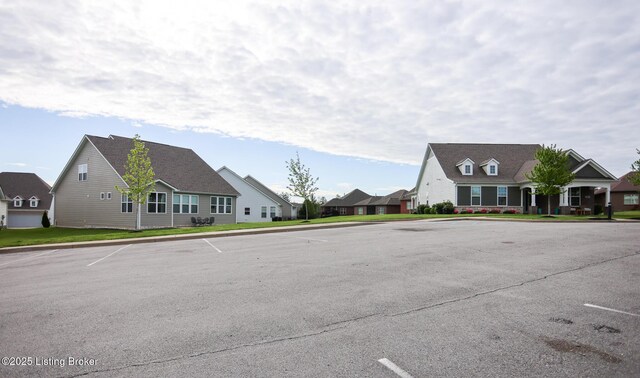2854 Hamilton Springs Dr, Louisville, KY 40245 - uncovered parking lot featuring a residential view
