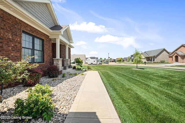 view of yard featuring a residential view