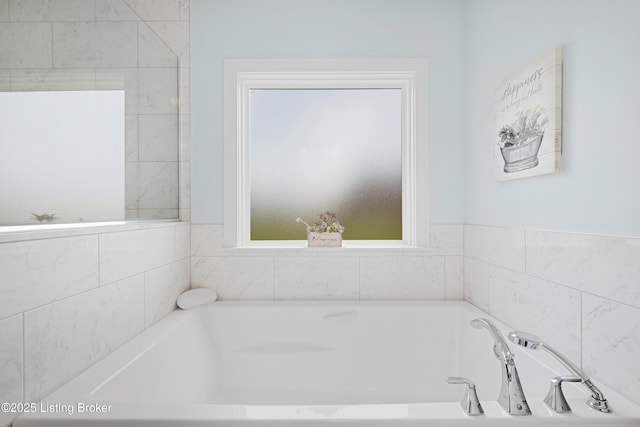 bathroom featuring a bath