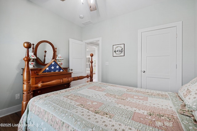 bedroom featuring baseboards, a ceiling fan, dark wood-style flooring, and visible vents