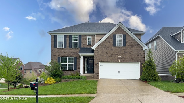 741 Dehart Ln, Louisville, KY 40243 - traditional-style house with an attached garage, concrete driveway, a front lawn, and brick siding