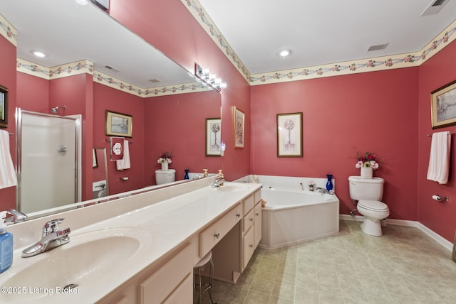bathroom with a bath, visible vents, a sink, baseboards, and toilet