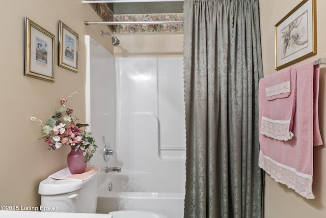 bathroom with shower / bathtub combination with curtain and toilet