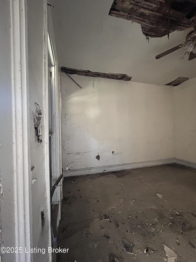 spare room with a ceiling fan