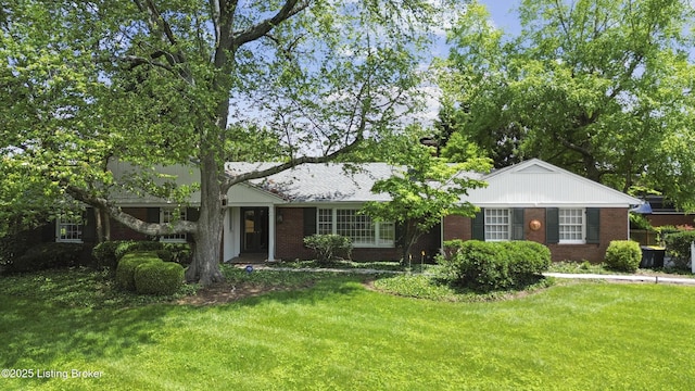 2224 Wynnewood Cir, Louisville, KY 40222 - view of front facade featuring brick siding and a front yard