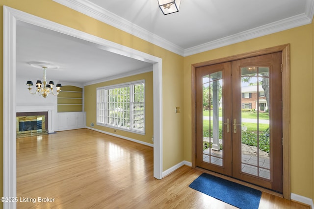 2224 Wynnewood Cir, Louisville, KY 40222 - entryway with french doors, light wood-style floors, plenty of natural light, baseboards, and ornamental molding