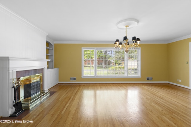 2224 Wynnewood Cir, Louisville, KY 40222 - unfurnished living room featuring a chandelier, baseboards, wood finished floors, a fireplace, and ornamental molding